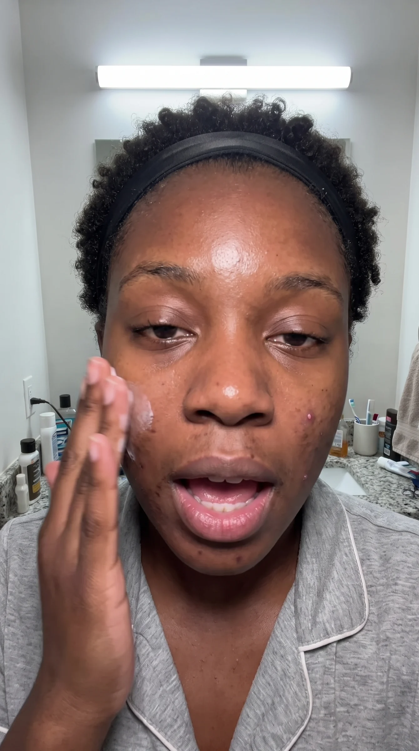 Black woman recast into the same skincare reference composition